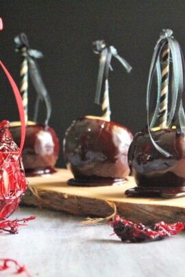 poison candy apples with ribbons around the stick