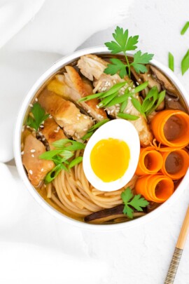 chicken ramen in a bowl with hard boiled egg