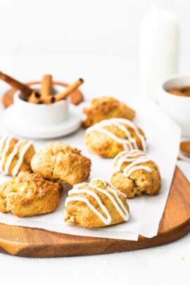 air fryer apple fritters displayed on a wood board