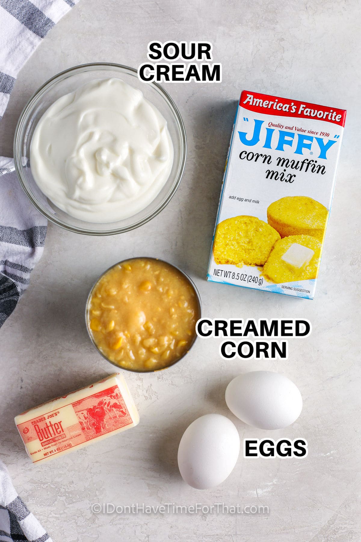 sour cream , jiffy corn muffin mix , creamed corn , eggs and butter with labels to make 5 Ingredient Corn Casserole