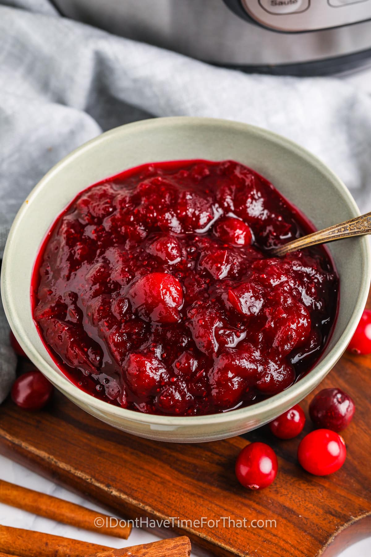 plated Instant Pot Cranberry Sauce with a spoon
