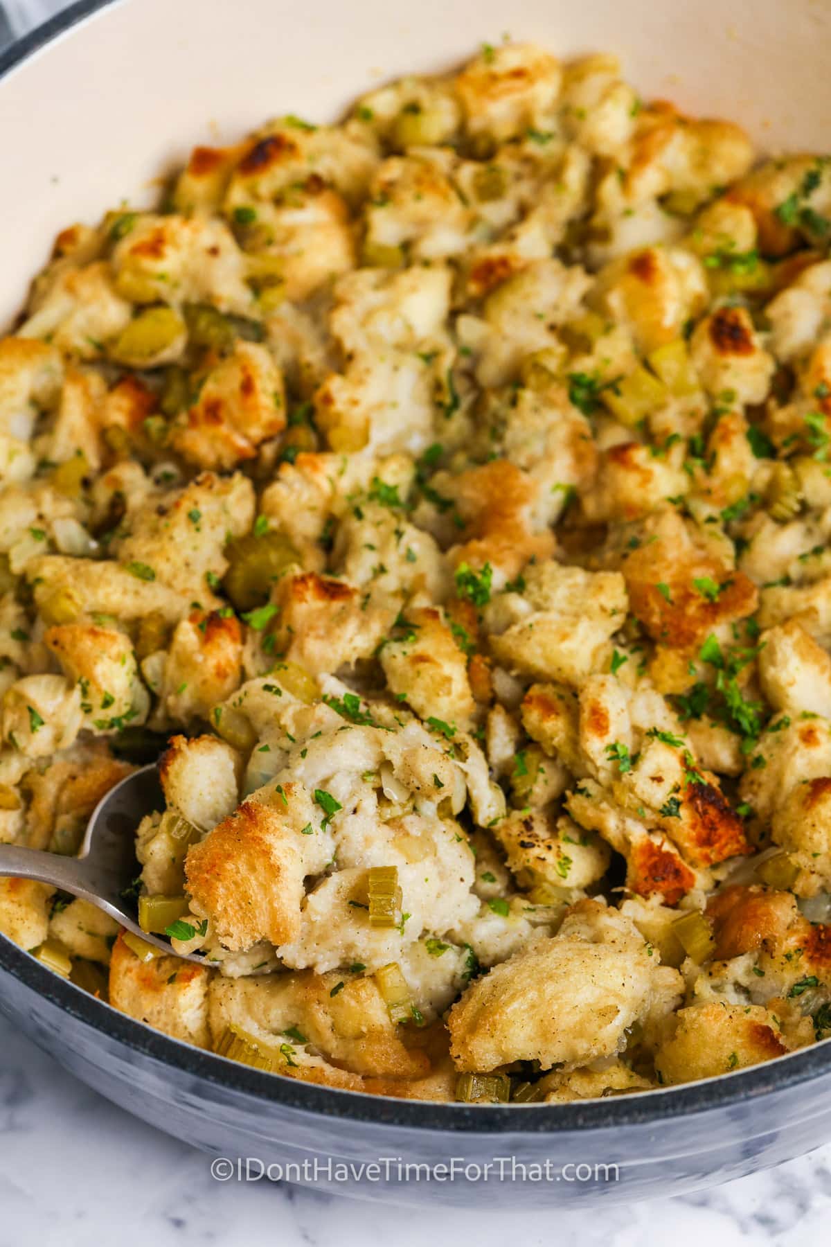 taking a spoonful of Stove Top Stuffing Recipe