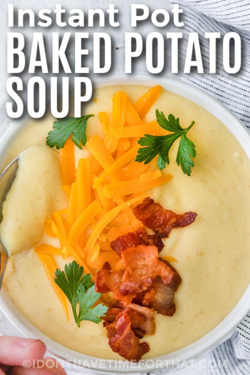 plated Instant Pot Loaded Baked Potato Soup with a title