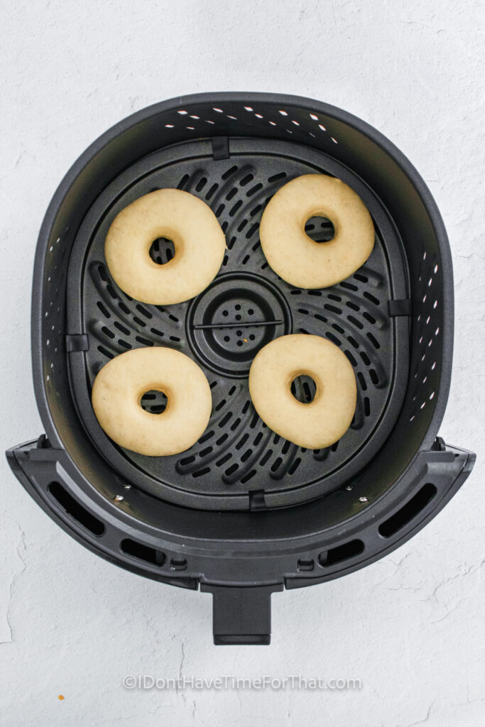 Air Fryer Donuts in the fryer before cooking