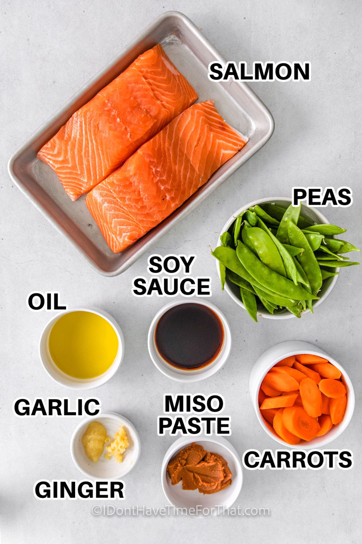 salmon , peas , soy sauce , oil , garlic , miso paste , ginger and carrots with labels to make Air Fryer Salmon