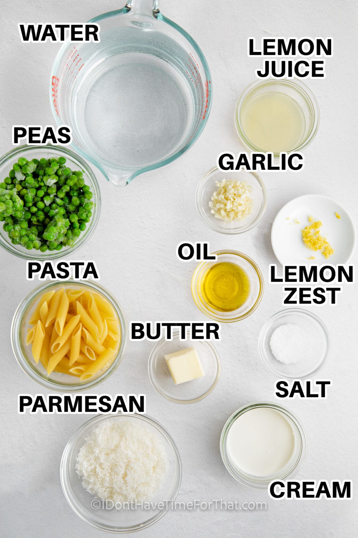 water , peas , lemon juice , garlic , lemon zest, oil , butter , salt , cream , parmesan and pasta with labels to make Instant Pot Lemon and Pea Pasta