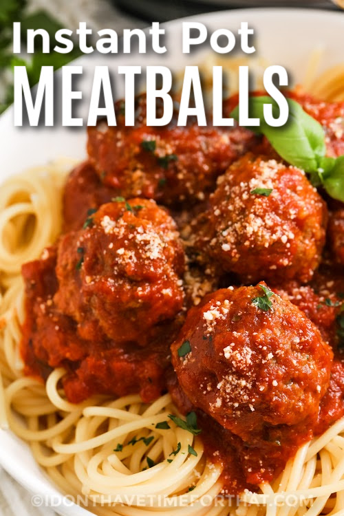 Instant Pot Meatballs served on pasta with marinara and parmesan with text