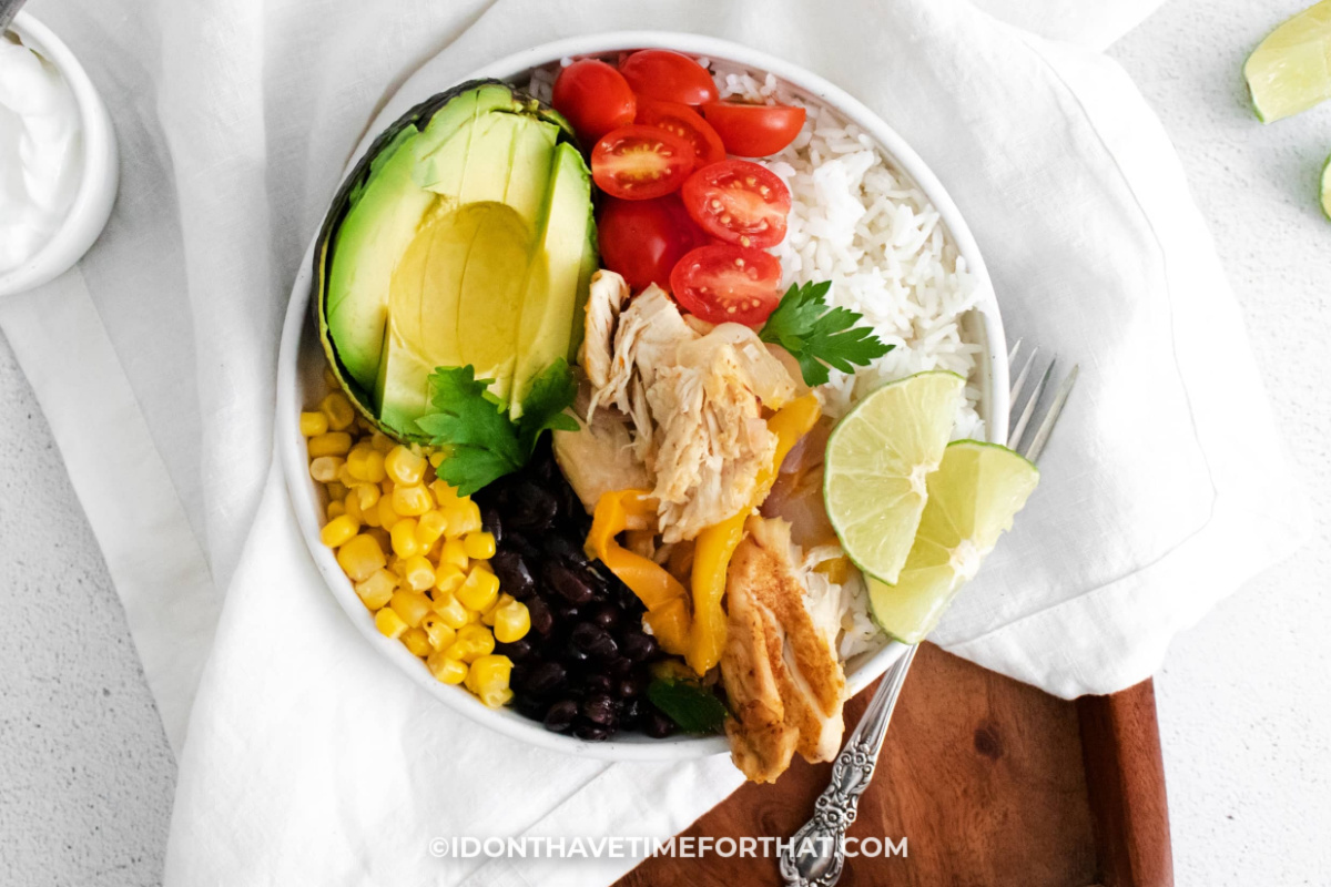 Instant Pot Chicken Fajita Bowl served on rice with toppings
