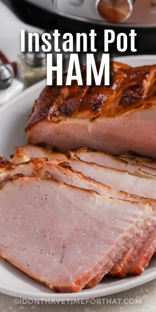 Instant Pot Ham sliced on a plate with a title